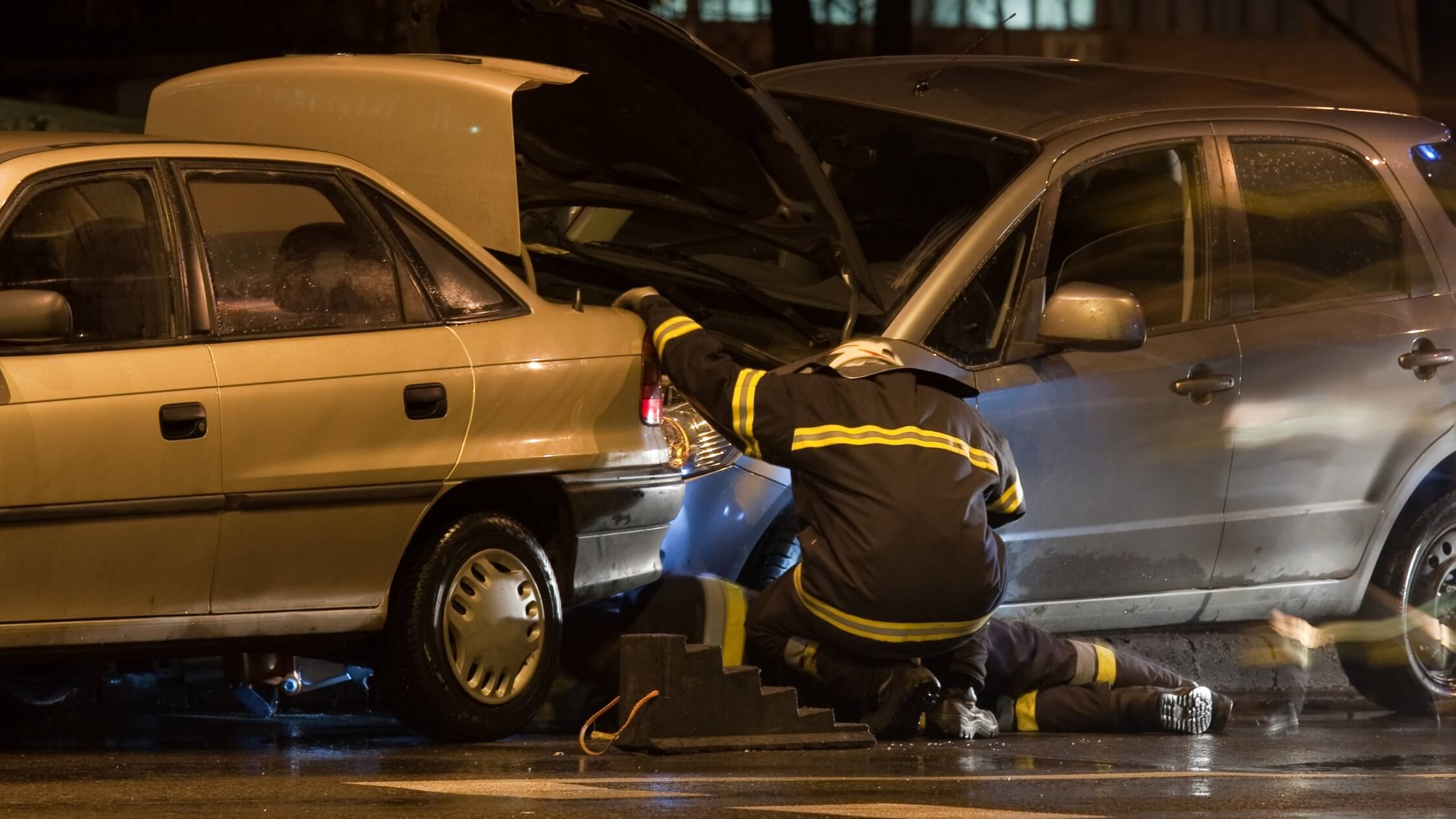 Dubai fuel station staff assisting drivers with minor accident documentation on New Year's Eve