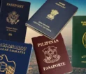 Collage of various international passport covers representing the new mandatory passport external cover page requirement for Dubai visa applications