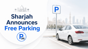Featured image with a clean white theme showing a white car parked beside a parking sign and a soft Sharjah skyline background. Large blue text reads: โSharjah Announces Free Parkingโ. Minimal modern design for a UAE public parking holiday announcement.